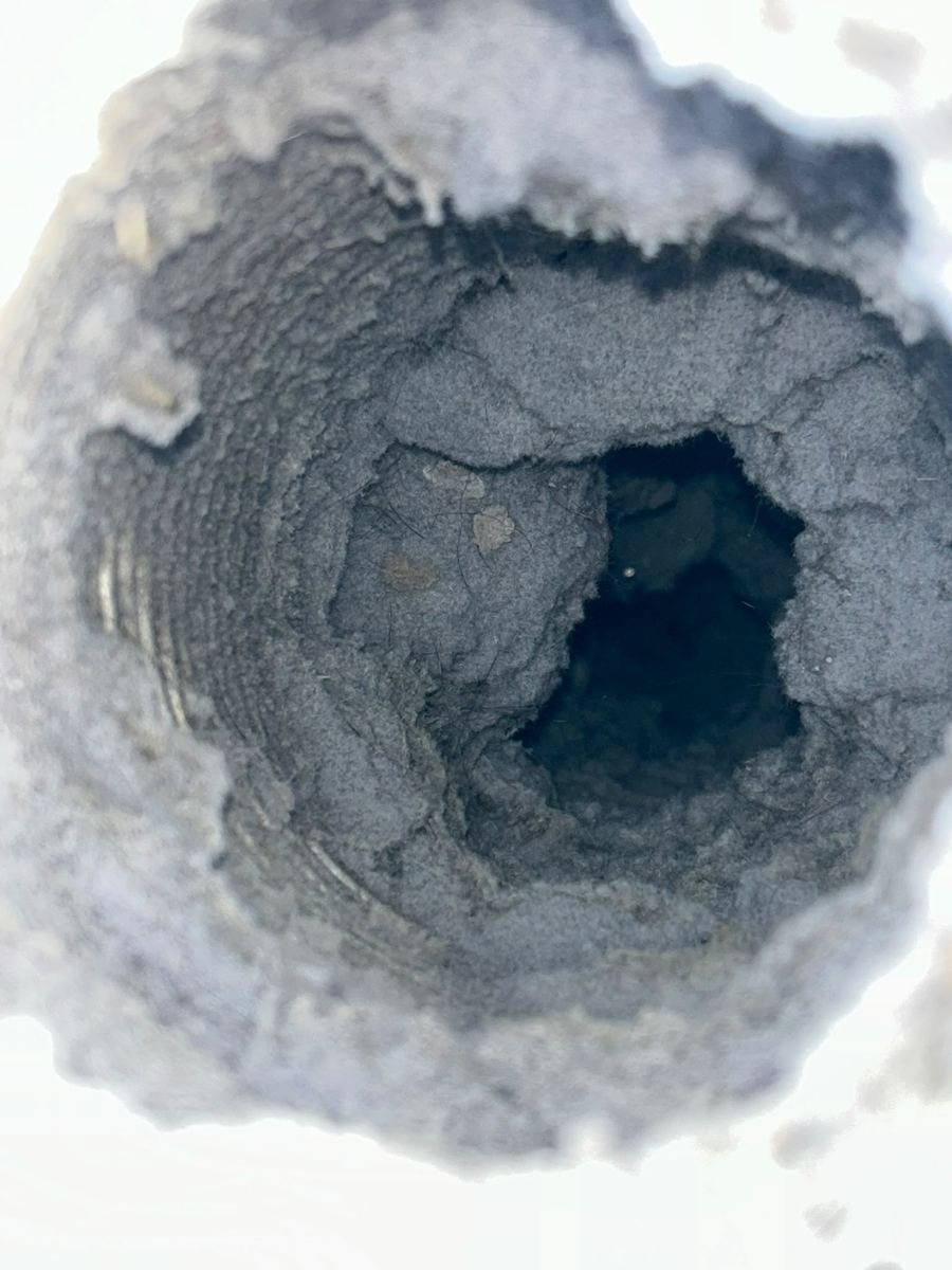 Dryer vent packed with lint before cleaning
